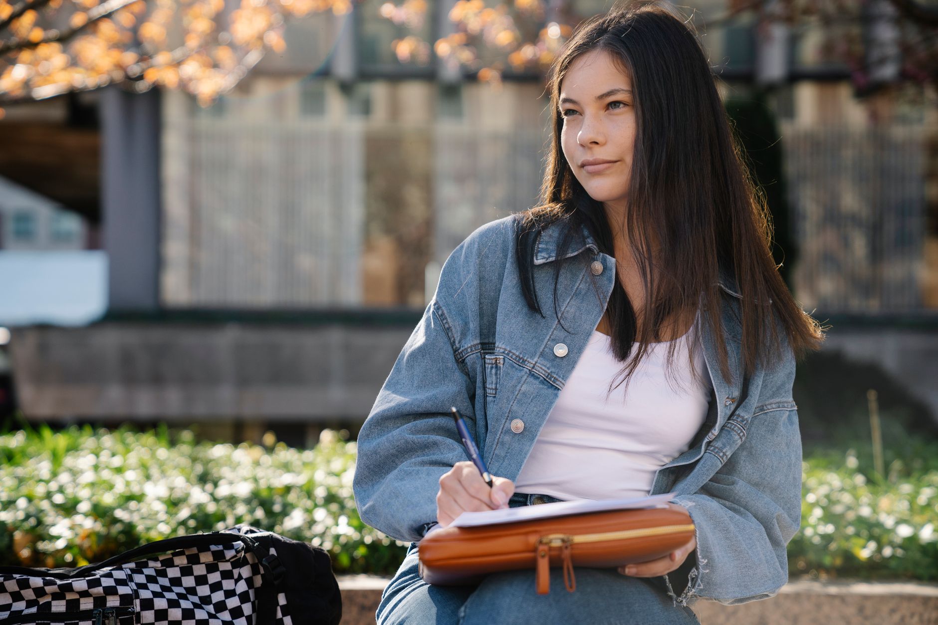 Students near a UK university accommodation building